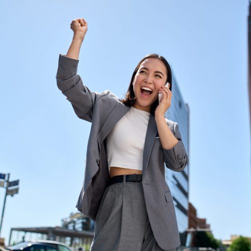 Young,Happy,Excited,Asian,Business,Woman,Entrepreneur,Winner,Standing,On